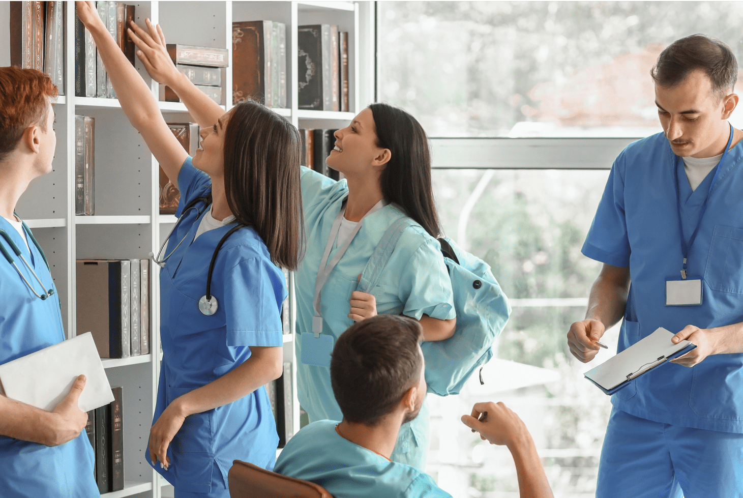 A diverse group of nursing students accessing and using educational resources